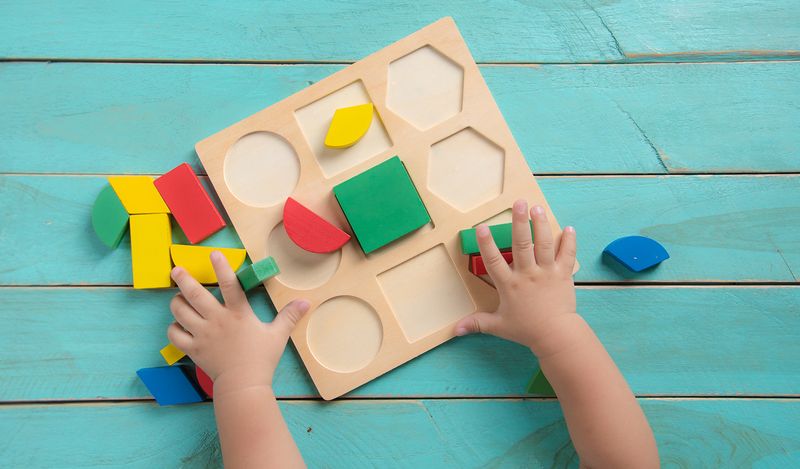 Image of a kids' puzzle with colourful blocks.
