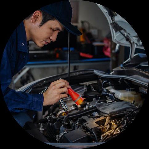 image of a mechanic making checks to a car as a metaphor for manual regression checks