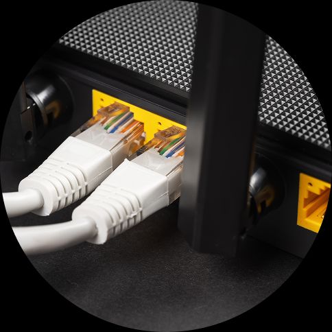 What is Network Compatibility Testing Two wires connected to a laptop