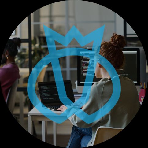 Testlio Alternatives for Test Management Tools Women at a desk testing software with a testlio logo over the top.